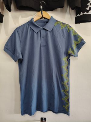 Polo. TBOLI HAND- EMBROIDERED POLO