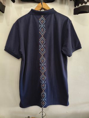 Polo. TBOLI HAND- EMBROIDERED POLO