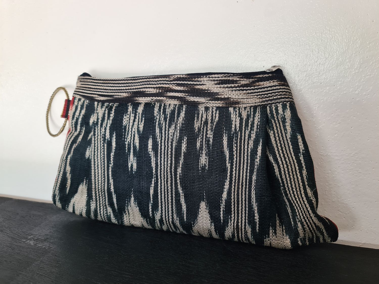 Clutch. T'NALAK CLUTH w/ BRASS HANDLE
