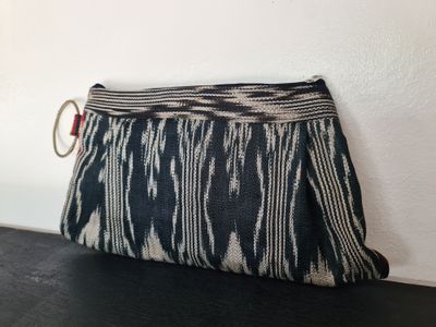 Clutch. T'NALAK CLUTH w/ BRASS HANDLE