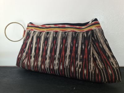 Clutch. T'NALAK CLUTH w/ BRASS HANDLE