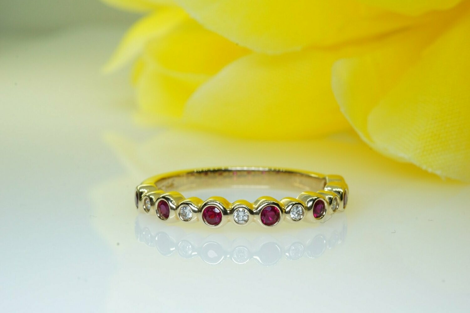 Ladies Ruby And Diamond 13 Stone Bezel Set Band Ring