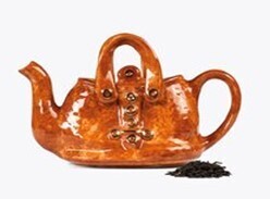 Yes this really is a tea pot, perfect that that handbag lover