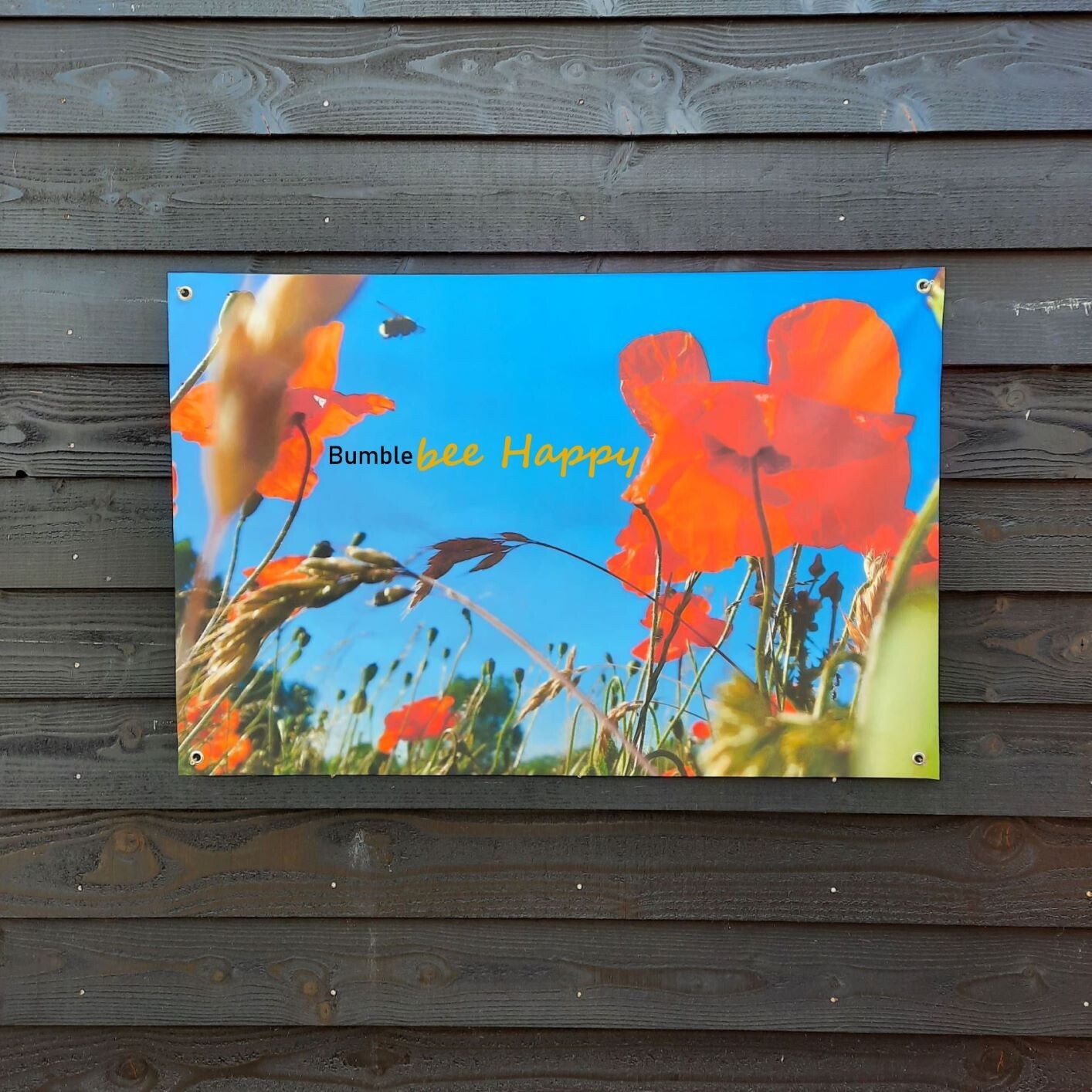 Tuinposter klaprozen en hommel 120 x 80 cm. - met tekst