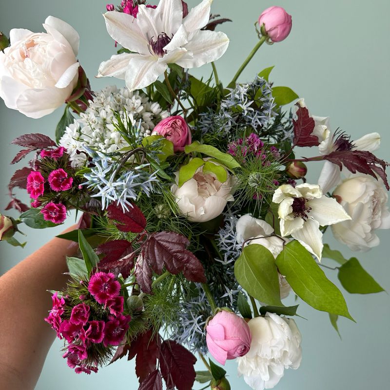 Seasonal fresh flower arrangement or bouquet designed with premium blooms and available for local delivery across Metro Detro
