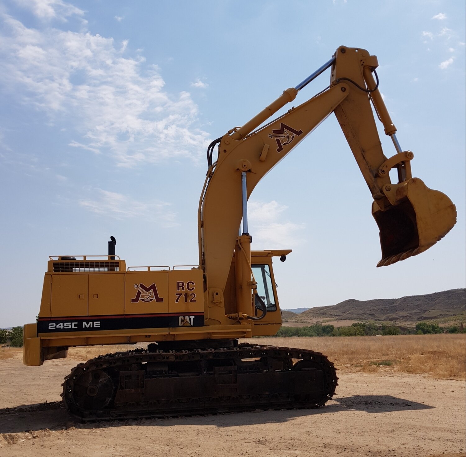 Retroexcavadora giratoria CATERPILLAR 245C ME