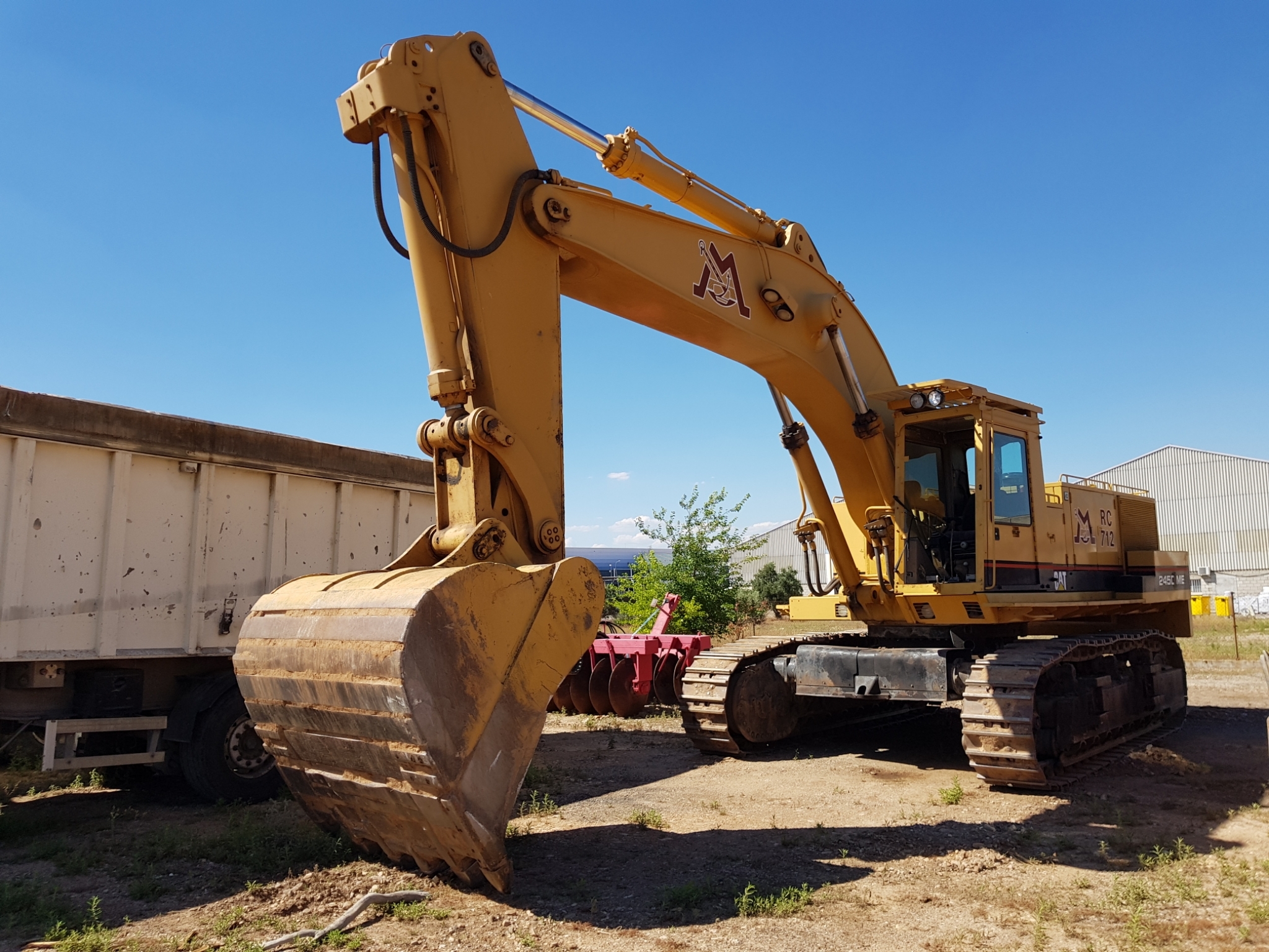 Retroexcavadora giratoria CATERPILLAR 245C ME