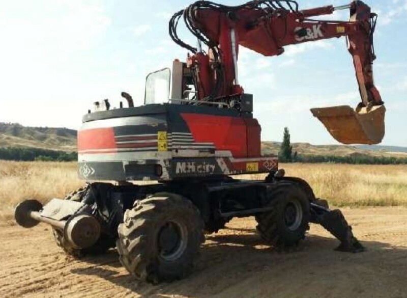 Retroexcavadora giratoria O&K MH CITY