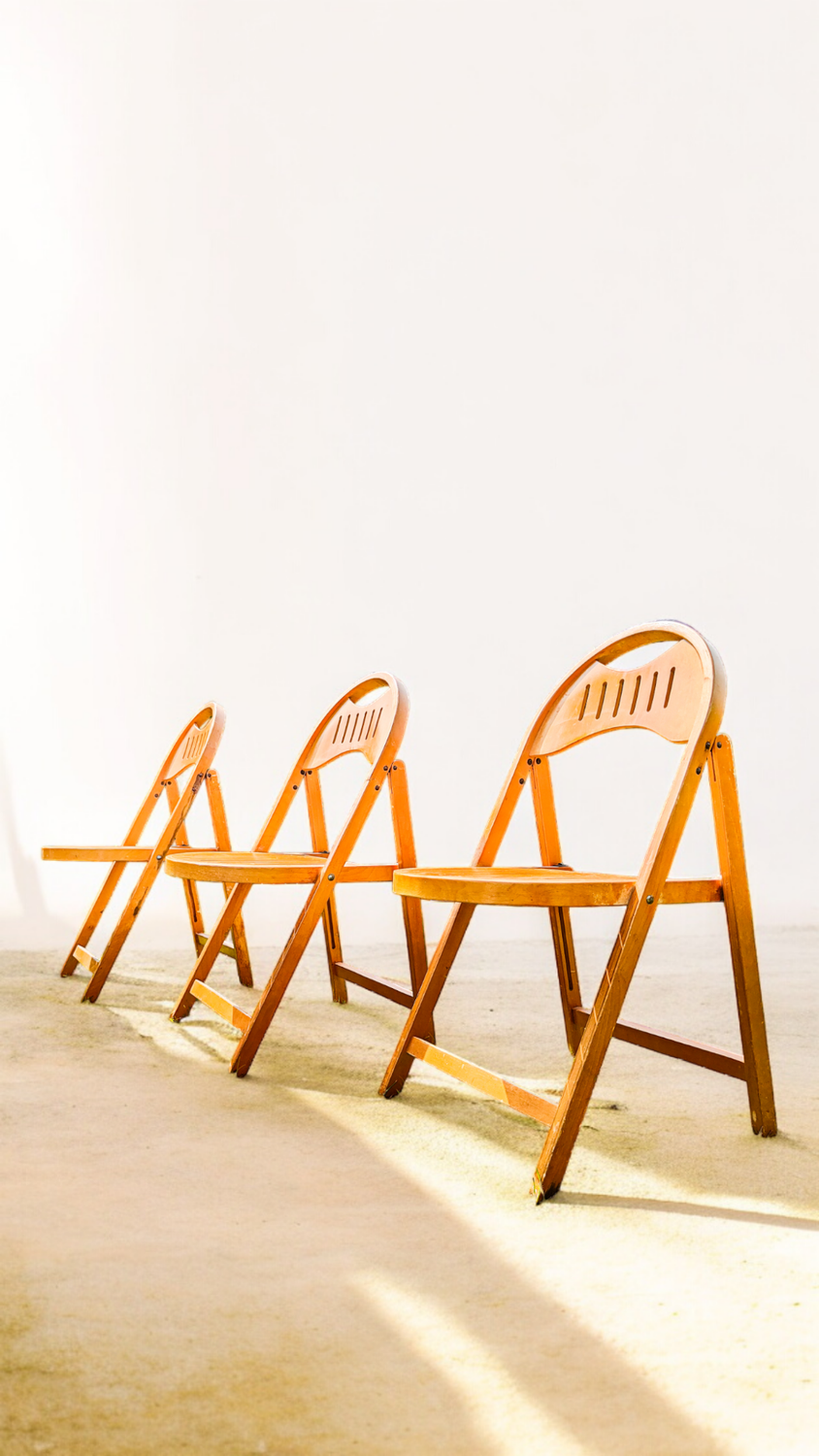 A Trio Of OTK Plywood and Beech Folding Chairs.