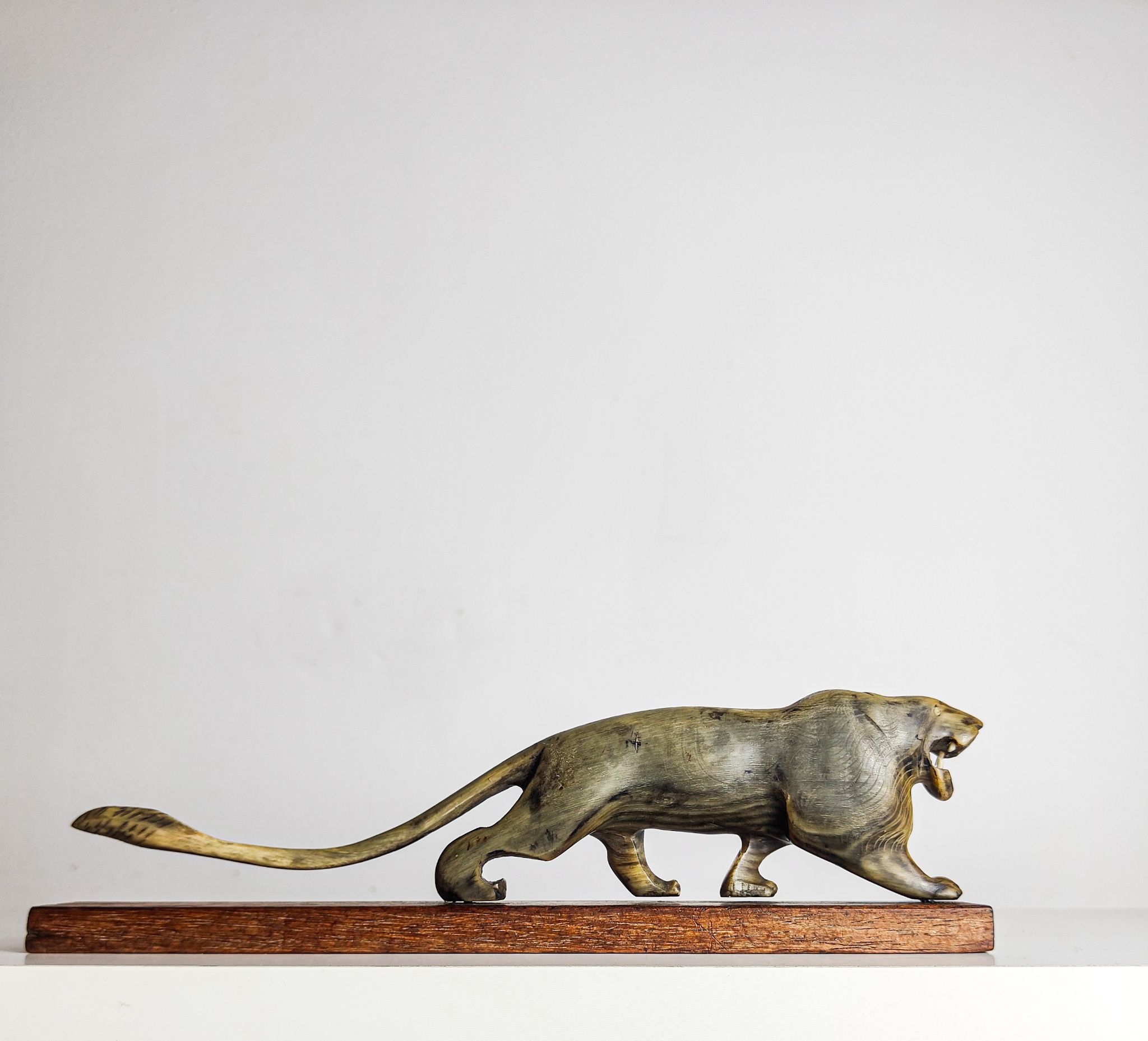 Mid-Century Modern Hand-Carved Horn Lion Sculpture