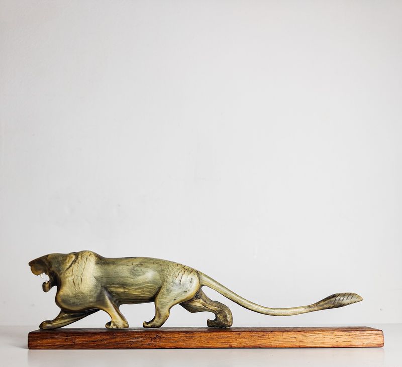 Mid-Century Modern Hand-Carved Horn Lion Sculpture Mid-Century Modern Hand-Carved Horn Lion Sculpture