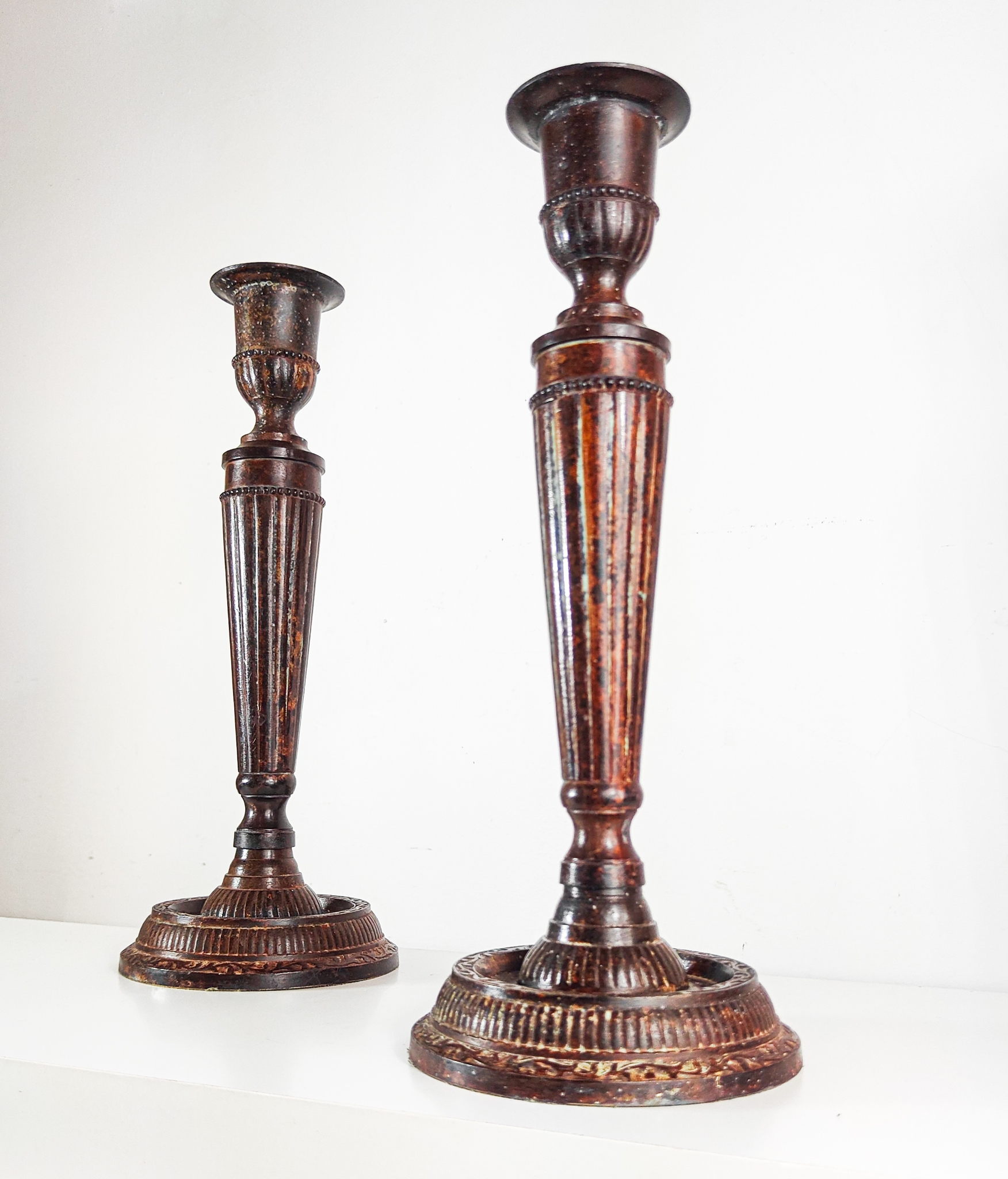 Pair of Antique Bronze Finished Fluted Candlesticks