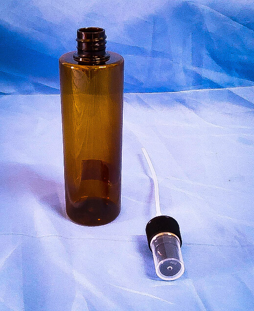 PET 150 mL Boston Dark Amber Plastic Container Threaded with Black Ribbed Pump Sprayer