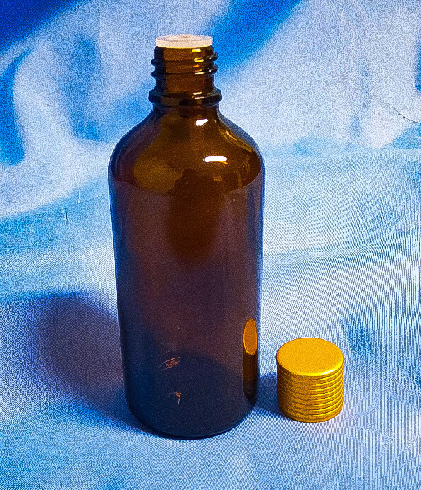 Amber Colored Container with Gold Aluminum Cap and Plug Glass Type