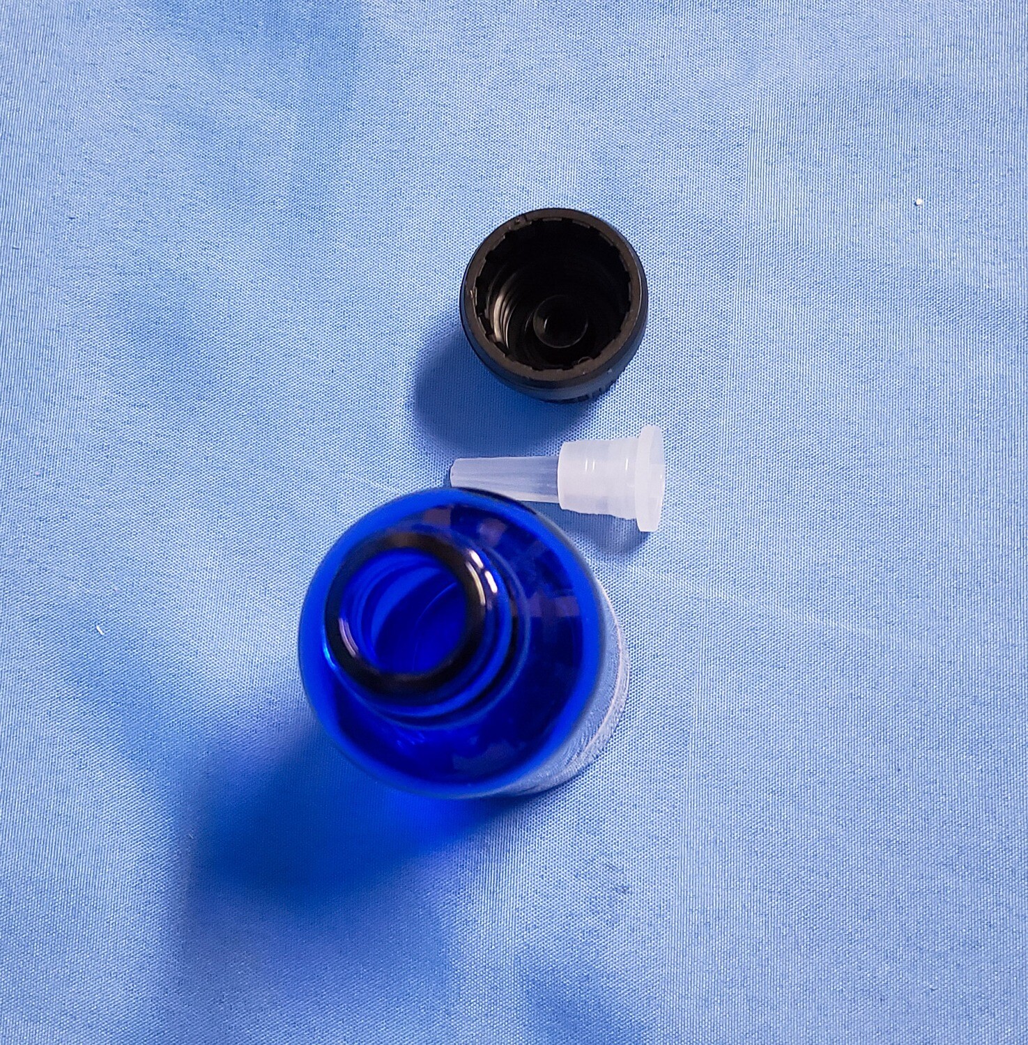 Cobalt Blue Glass Bottle with Black Cap and Plug Reducer