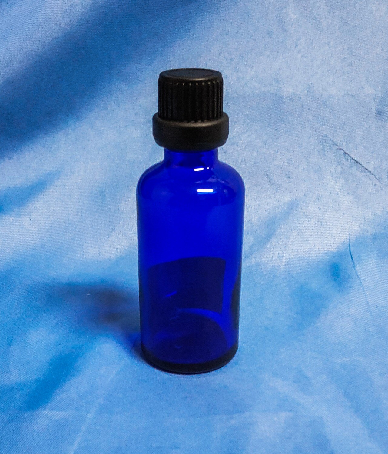 Cobalt Blue Glass Bottle with Black Cap and Plug Reducer