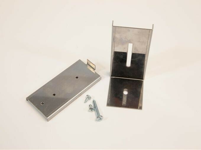 Foot securing bracket for floor standing heater