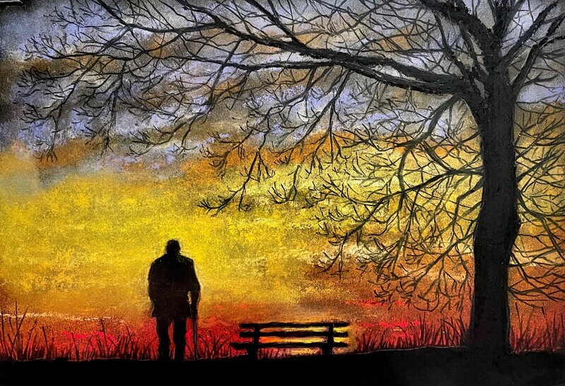 Man by a bench in Silhouette Against a Sunset in Pastels