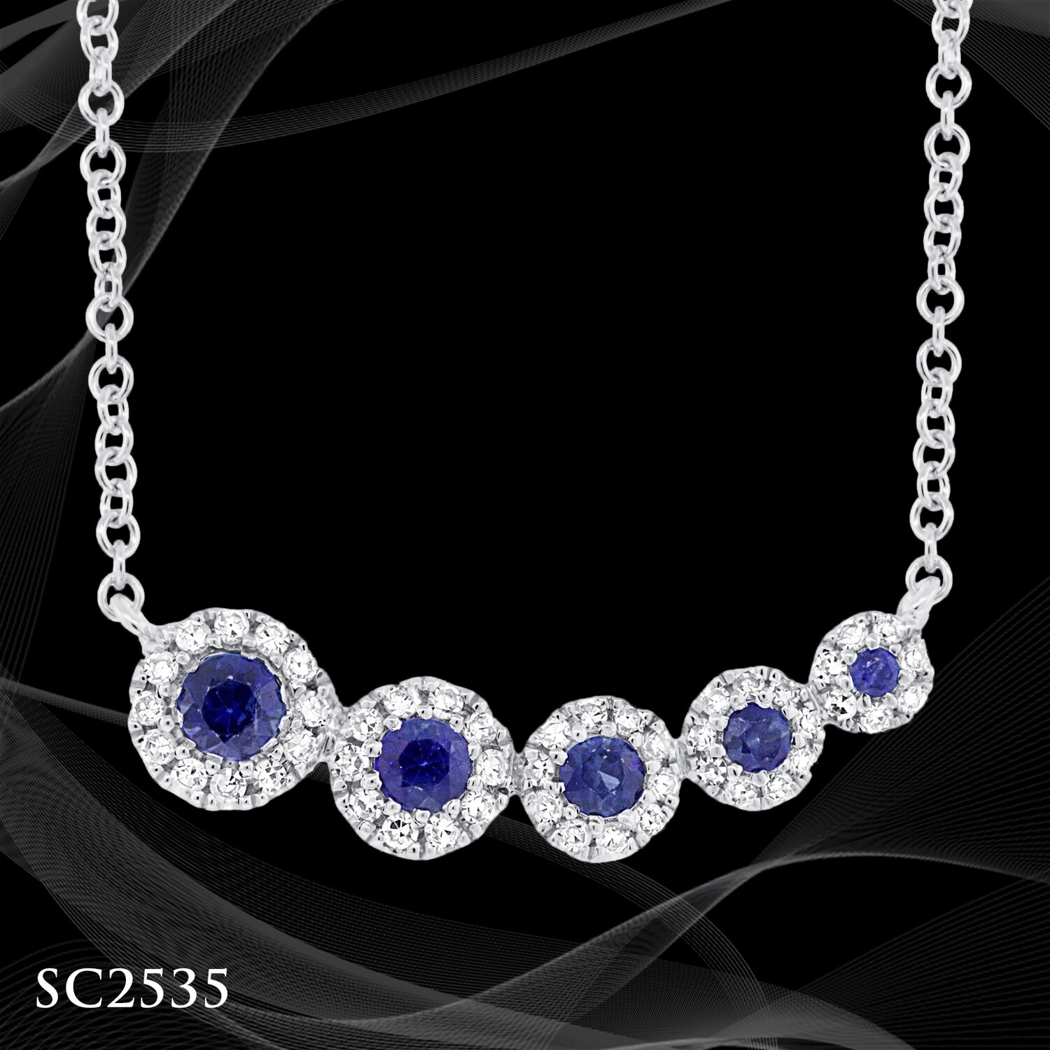 14 Karat White Gold Diamond and Sapphire Pendant 14 Karat White Gold Diamond and Sapphire Pendant