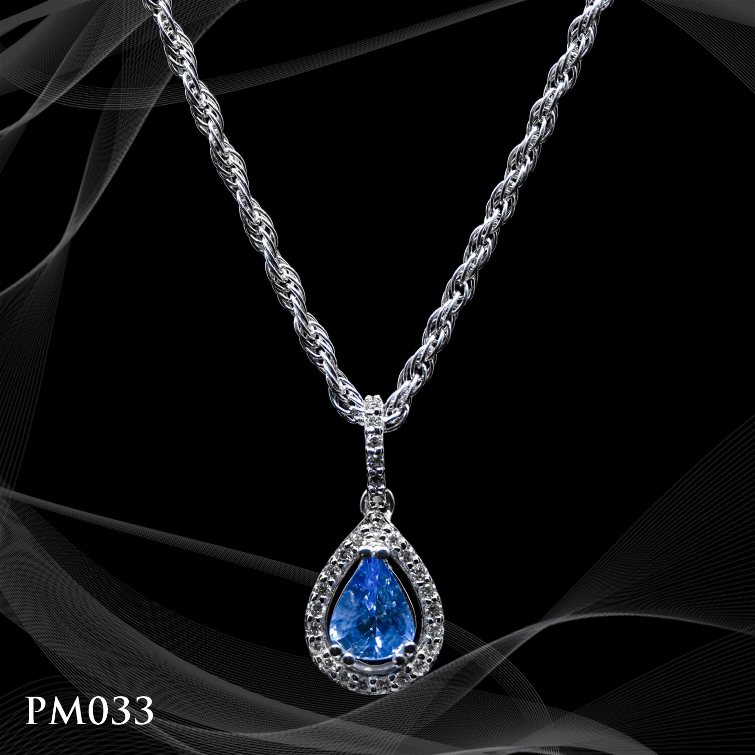 14 Karat Whir Gold Tear Drop Sapphire and Diamond Pendant 14 Karat Whir Gold Tear Drop Sapphire and Diamond Pendant