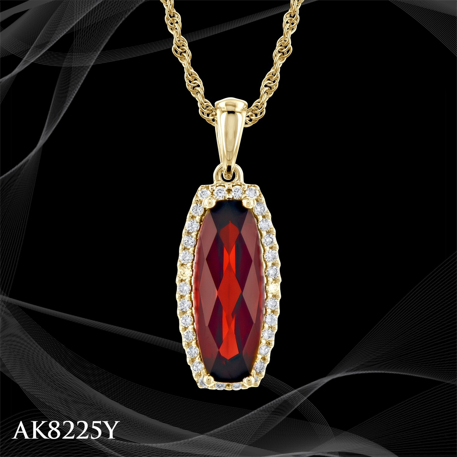 14 KARAT YELLOW GOLD DIAMOND AND GARNET PENDANT 14 KARAT YELLOW GOLD DIAMOND AND GARNET PENDANT