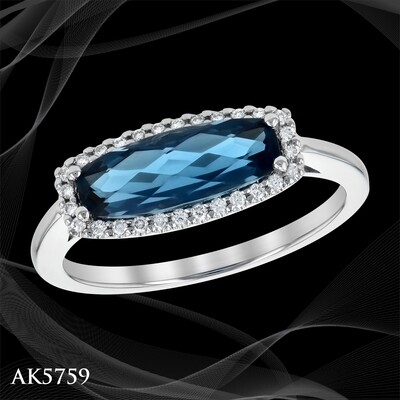 14 KARAT WHITE GOLD BLUE TOPAZ AND DIAMOND FASHION RING 14 KARAT WHITE GOLD BLUE TOPAZ AND DIAMOND FASHION RING
