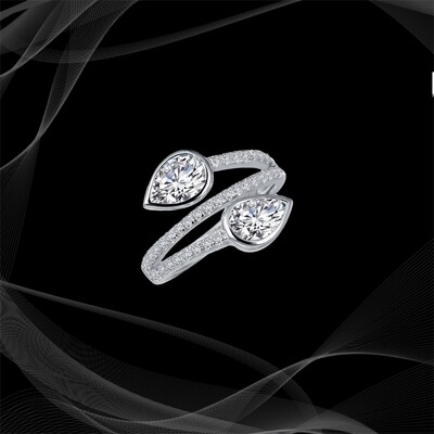 RO2CLP-7 STERLING SILVER RING WITH BYPASS DESIGN FEATURING TWO PEAR SHAPE SIMULATED DIAMONDS BEZEL SET. TOTAL DIAMOND WEIGHT IS 1.81 CTS. SIZE 7