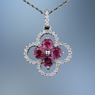 14KT WHITE GOLD PENDANT & CHAIN FEATURING 4 RUBIES TOTALING 1.20 CTS AND 30 ROUND BRILLIANT CUT DIAMONDS TOTALING 0.30 CTS