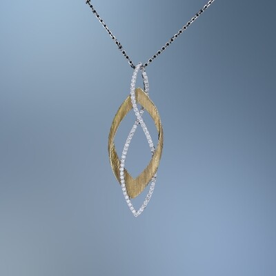 14KT TWO-TONE DIAMOND PENDANT FEATURING 76 ROUND BRILLIANT CUT DIAMONDS TOTALING 0.04 CTS.