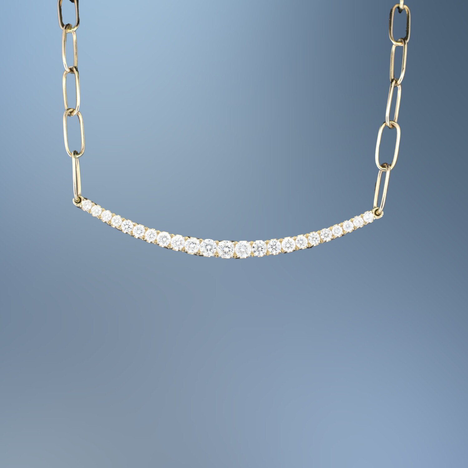 ONE 14KT YELLOW GOLD LADYS DIAMOND PENDANT CONTAINING .51 CTTW OF NATURAL ROUND BRILLIANT CUT DIAMONDS WITH AN ADJUSTABLE CHAIN AND A LOBSTER CLAW CLASP