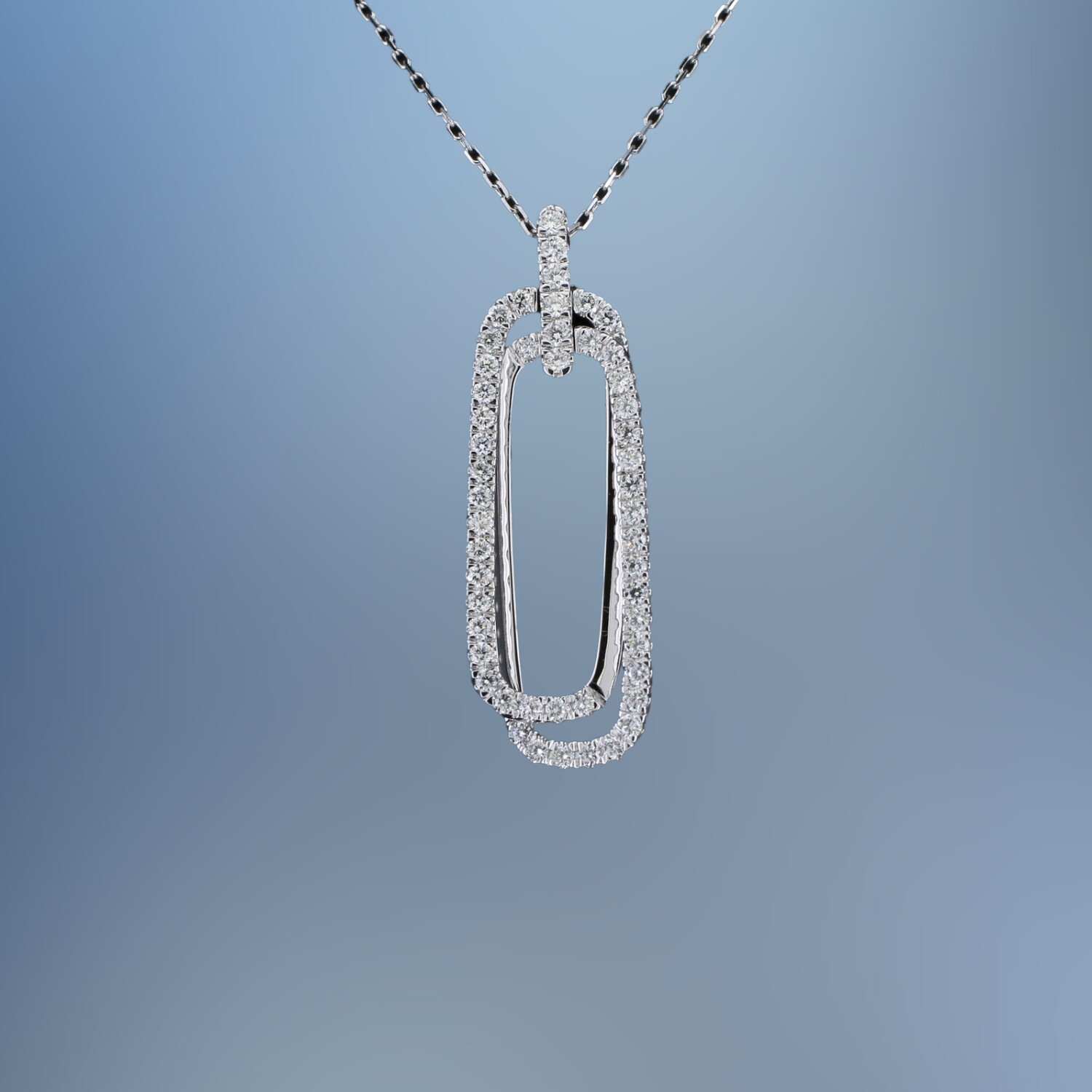 14KT WHITE GOLD DIAMOND PENDANT FEATURING 50 ROUND BRILLIANT CUT DIAMONDS TOTALING 0.50 CTS 14KT WHITE GOLD DIAMOND PENDANT FEATURING 50 ROUND BRILLIANT CUT DIAMONDS TOTALING 0.50 CTS