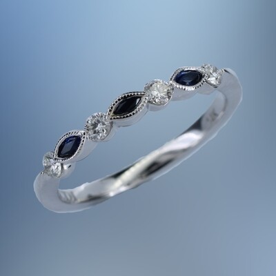 14KT WHITE GOLD DIAMOND & SAPPHIRE BAND CONTAINING 4 ROUND BRILLIANT DIAMONDS TOTALING .19 CTS & 3 MARQ SAPHIRES TOTALING .14 CTS