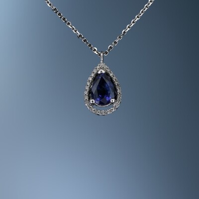14KT WHITE GOLD PENDANT FEATURING 27 ROUND BRILLIANT CUT DIAMONDS TOTALING 0.08 CTS AND 1 SAPPHIRE TOTALING 0.95 CTS
