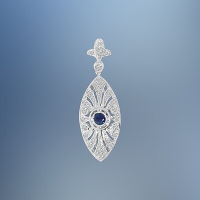 14KT WHITE GOLD SAPPHIRE & DIAMOND PENDANT FEATURING A .16 CT SAPPHIRE AND .20 CTS OF ROUND BRILLIANT CUT DIAMONDS 14KT WHITE GOLD SAPPHIRE & DIAMOND PENDANT FEATURING A .16 CT SAPPHIRE AND .20 CTS OF ROUND BRILLIANT CUT DIAMONDS