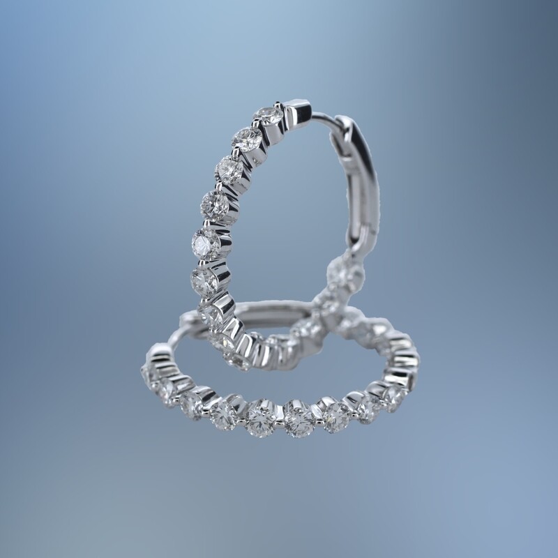 14KT WHITE GOLD ROUND IN AND OUT DIAMOND HOOP EARRINGS FEATURING 28 ROUND BRILLIANT CUT DIAMONDS TOTALING 1.49 CTS.
