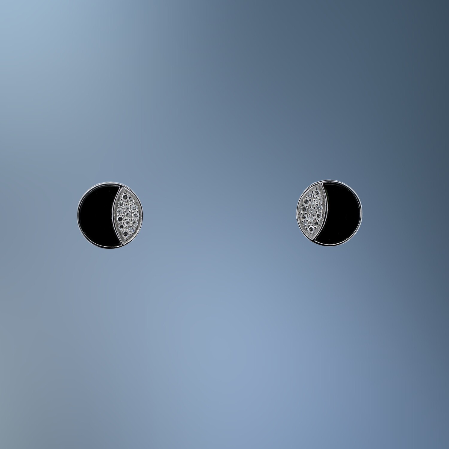 14KT WHITE GOLD BLACK ONYX AND DIAMOND EARRINGS FEATURING ROUND BRILLIANT CUT DIAMONDS TOTALING .07 CTS 14KT WHITE GOLD BLACK ONYX AND DIAMOND EARRINGS FEATURING ROUND BRILLIANT CUT DIAMONDS TOTALING .07 CTS