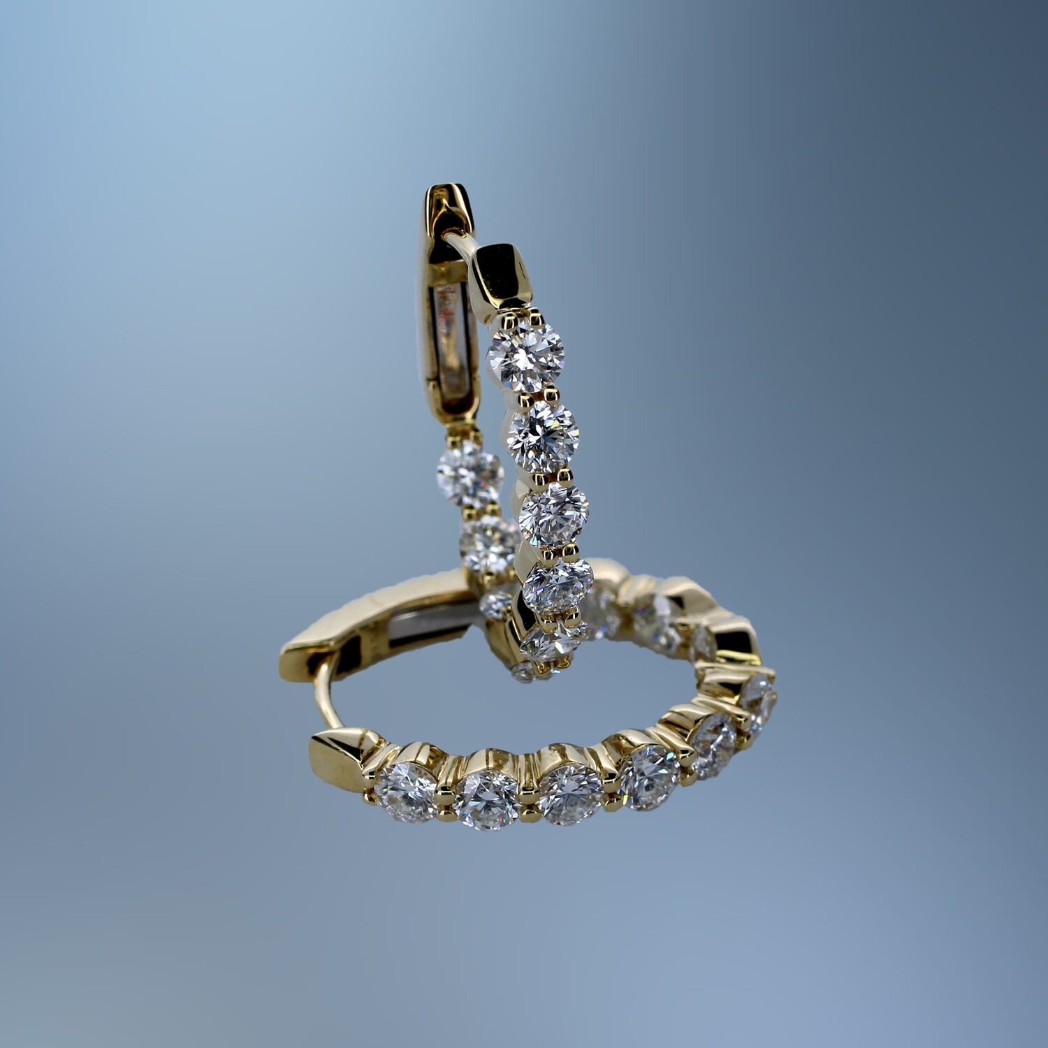 14KT YELLOW  GOLD OVAL DIAMOND INSIDE/OUTSIDE HOOP EARRINGS FEATURING 18  ROUND BRILLIANT CUT DIAMONDS TOTALING 1.53 CTS