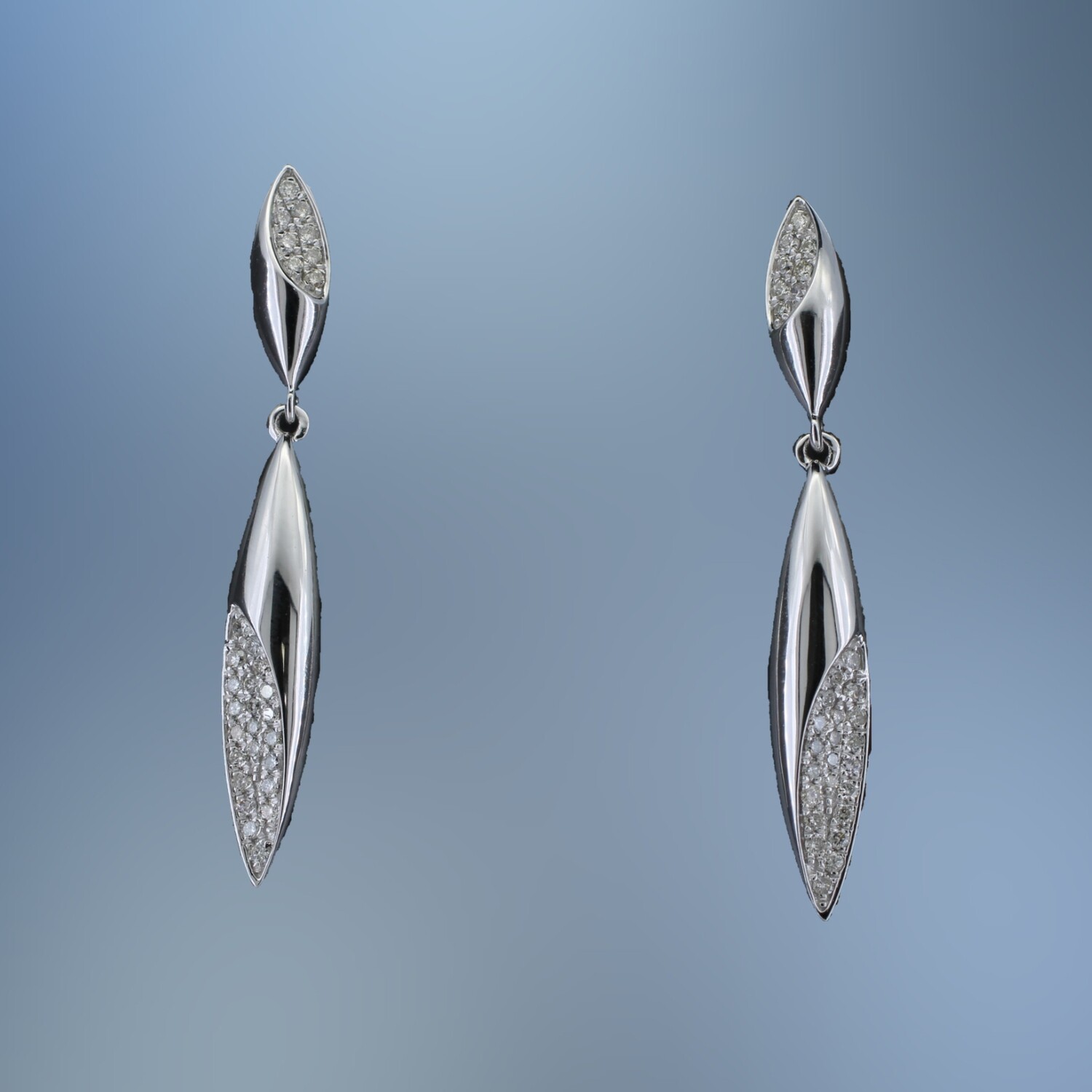 14KT WHITE GOLD AND DIAMOND LADY'S DANGLE EARRINGS FEATURING ROUND BRILLIANT CUT DIAMONDS TOTALING 0.31 CTS