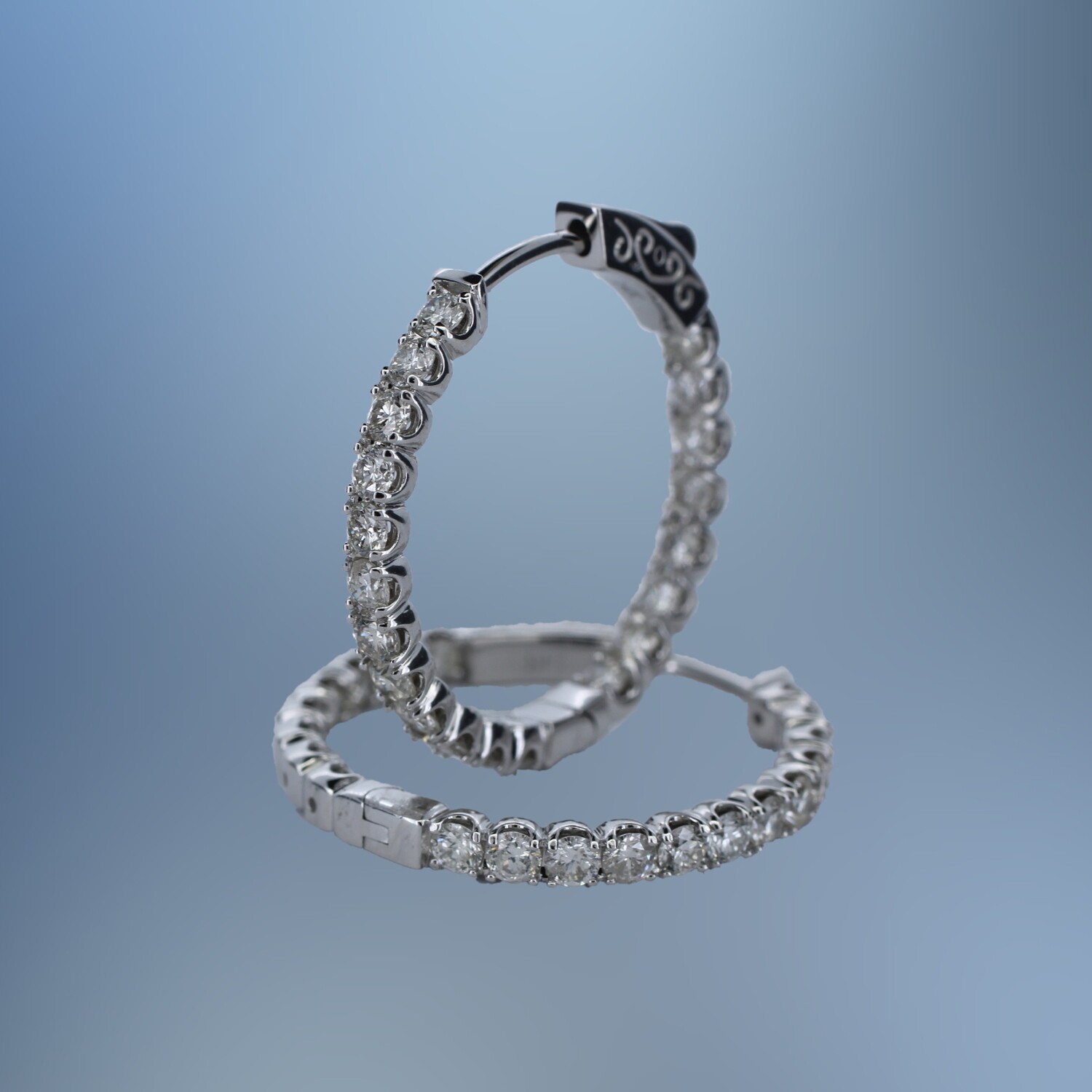 PM1809W  14KT WHITE GOLD "IN AND OUT" DIAMOND HOOP EARRINGS FEATURING 40 ROUND BRILLIANT CUT DIAMONDS TOTALING 1.85 CTS.