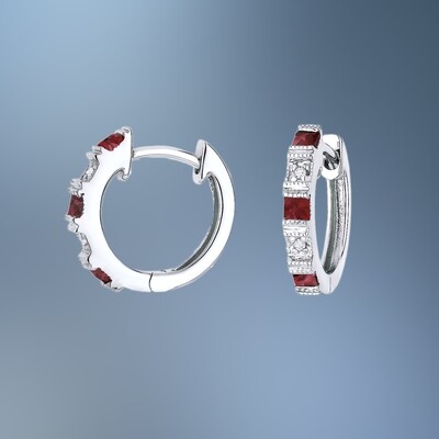 14KT WHITE GOLD DIAMOND AND RUBY HUGGIE EARRINGS FEATURING 4 ROUND BRILLIANT CUT DIAMONDS TOTALING 0.02 CTS AND 6 ROUND RUBIES TOTALING 0.27 CTS