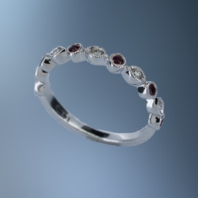 14KT WHITE GOLD DIAMOND & RUBY BAND CONTAINING 5 ROUND BRILLIANT DIAMONDS TOTALING .08 CTS & 6 ROUND RUBIES TOTALING .17 CTS 