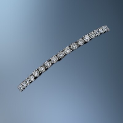 14KT WHITE GOLD DIAMOND BRACELET FEATURING 49 ROUND BRILLIANT DIAMONDS TOTALING 6.77 CTS