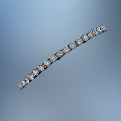 18KT WHITE GOLD DIAMOND BRACELET FEATURING 41 ROUND BRILLIANT DIAMONDS TOTALING 11.58 CTS