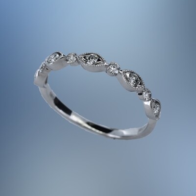 ML1582W 14KT WHITE GOLD DIAMOND WEDDING BAND FEATURING ROUND BRILLIANT CUT DIAMONDS TOTALING .31 CTS