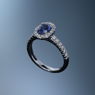 14KT WHITE GOLD DIAMOND & SAPPHIRE RING FEATURING 1 SAPPHIRE TOTALING 0.78 CTS AND 28 ROUND BRILLIANT DIAMONDS TOTALING .40 CTS