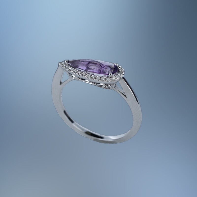 14KT WHITE GOLD RING FEATURING 1 FANTASY CUT AMETHYST TOTALING 1.10 CTS AND 29 ROUND BRILLIANT CUT DIAMONDS TOTALING .08 CTS