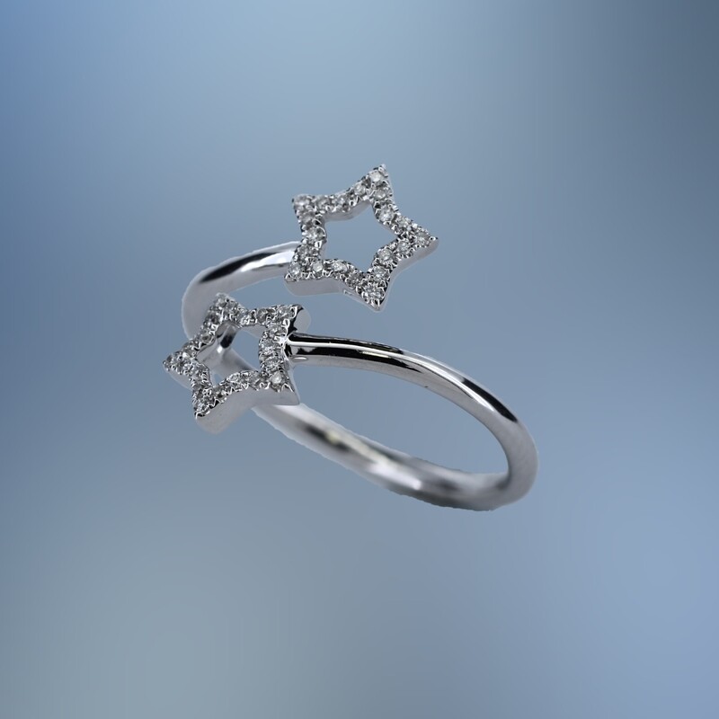 14KT WHITE GOLD DIAMOND STAR BYPASS RING FEATURING 40 ROUND BRILLIANT CUT DIAMONDS TOTALING .12 CTS