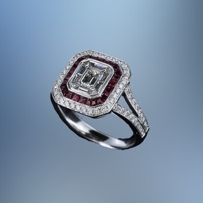 14KT WHITE GOLD DIAMOND & RUBY FASHION RING FEATURING 45 DIAMONDS & 25 PRINCESS CUT RUBIES WITH A TOTAL WEIGHT OF 1.53 CTS.