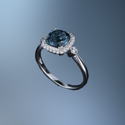 14KT WHITE GOLD BLUE TOPAZ FASHION RING FEATURING A CUSHION CUT BLUE TOPAZ TOTALING 1.62 CTS AND 26 ROUND BRILLIANT CUT DIAMONDS TOTALING 0.16 CTS
