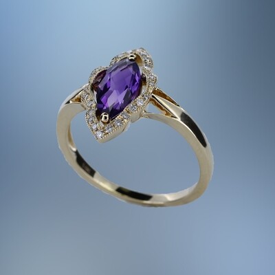 14KT YELLOW GOLD AMETHYST & DIAMOND RING FEATURING  .12 CTS OF ROUND BRILLIANT DIAMONDS & ONE 1.01 FANCY CUT AMETHYST